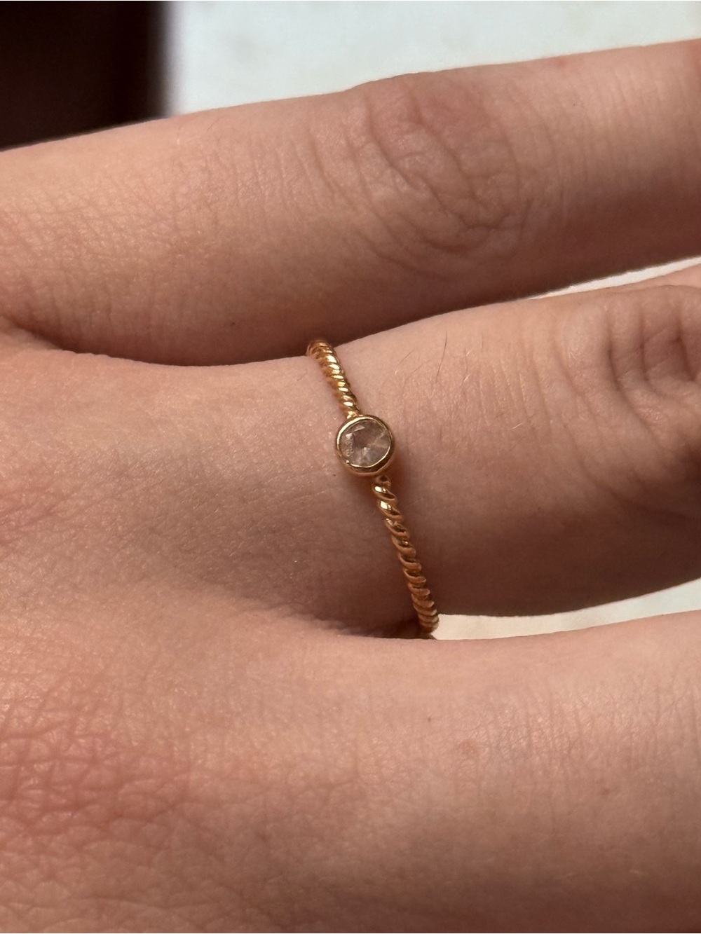 Delicate Gold Twisted Band Ring with Clear Stone